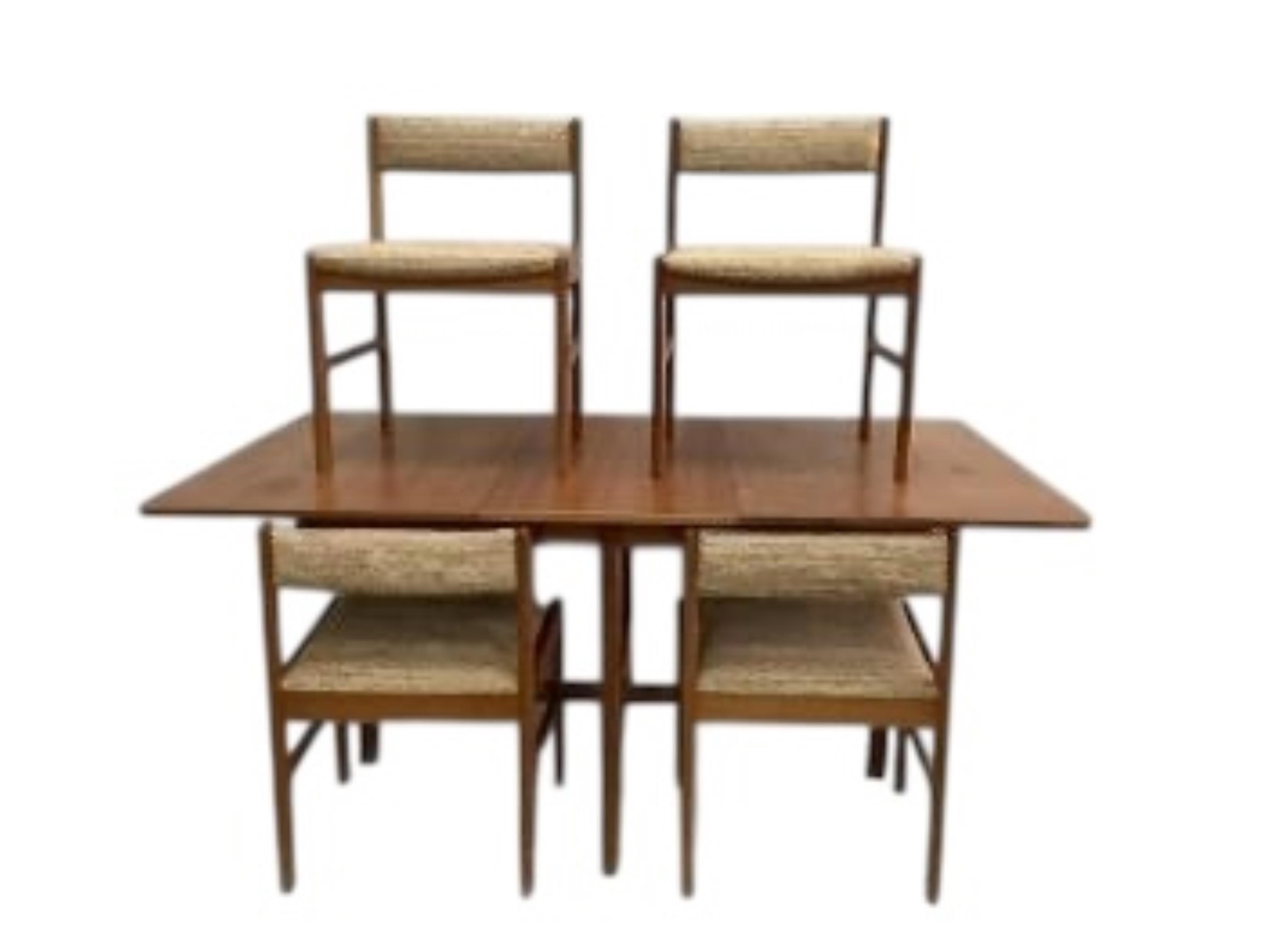 A mid century Danish style MacIntosh Forfar teak sideboard, width 170cm, depth 46cm, height 102cm together with a McIntosh teak extending dining table and four chairs teak sideboard, width 170cm, depth 46cm, height 102cm